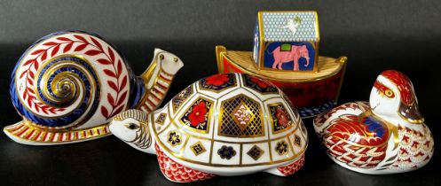 Six Crown Derby figures in the Imari style; a duck, snail, tortoise, two birds and a Noah's Ark