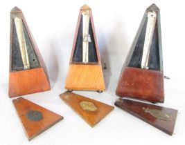 Three Maelzel metronomes