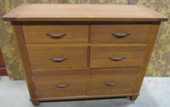 Contemporary oak chest of drawers, fitted with four drawers and two lower cupboards, with pegged