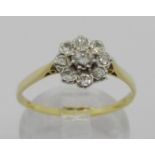 Yellow metal diamond cluster ring, centre stone 0.20ct approx, size P/Q, 2.1g