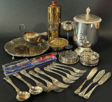 A miscellaneous collection of silver plated items including a tray, wine cooler, a chalice, a flower