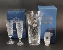 A Royal Scot glass vase with etched daffodils, a pair of Stuart Crystal Champagne flutes all with