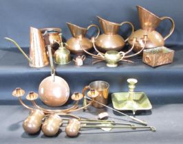 Collection of copper and brass ware, including three graduated ale jugs, candlesticks, casket ladles