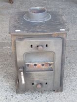 A small Arada cast iron log burner, 32cm wide x 46cm wide x 30cm deep