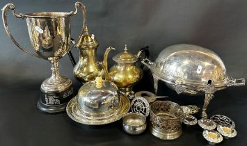 A selection of silver plated tableware, including a teapot and a coffee pot, a large trophy, a