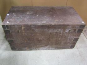 A heavy teak? or possibly pitch pine strongbox with hinged lid, twin lock and overlaid corner