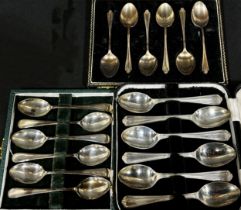 Three boxed sets of six silver teaspoons and a single small silver sugar tong, 7.3 ozs approximately