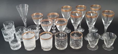Six gold rimmed wine glasses on spiral stems, four engraved wine glasses with gold rims, together