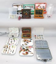 A Quantity of fishing flies and lures for trout, salmon, including mayflies, silver sticklebacks