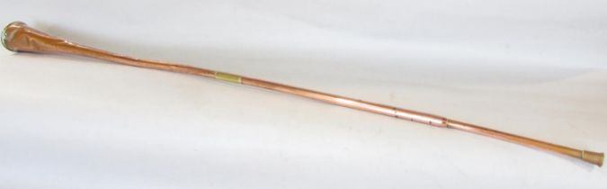 A 19th century London to Bath copper coaching horn, engraved to the horn, dented and with a hole,
