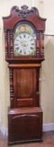 A substantial 19th century mahogany with broken arch painted dial, subsidiary calendar and secondary