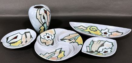 Seven pieces of Dutch Artistique wares, principally dishes, inscribed Gouda with geometric
