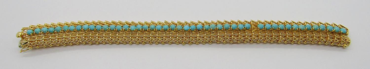 Vintage foreign yellow metal bracelet set with a line of turquoise cabochons (one vacant), with twin - Image 3 of 6