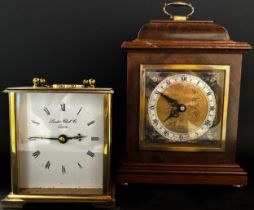 Small figured walnut mantle clock in the form of a Georgian bracket clock by Elliott of London