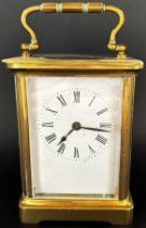 Brass carriage clock with enamelled dial and eight day timepiece