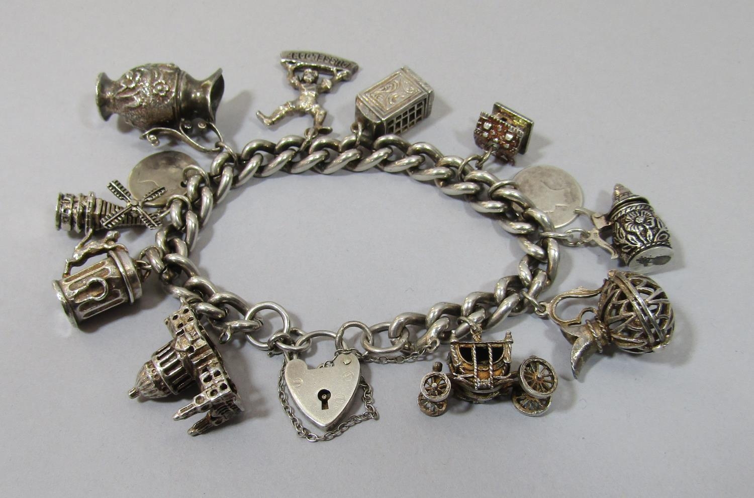 Mixed lot of vintage silver jewellery to include two curb link novelty charm bracelets, a Siam - Image 2 of 3