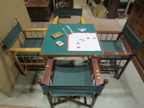 A simple wooden folding card table with baize top together with four accompanying folding