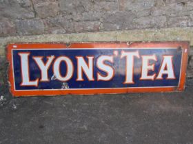 An old Lyons' Tea rectangular enamel sign (af) 150 cm x 45 cm