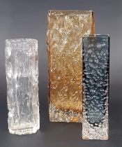 Three Whitefriars style bark vases, one green, one amber, and one clear, 18cm , 22cm and 17cm