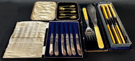 An oak canteen of cutlery (incomplete), a cased set of fish servers, a case of 'gold' coffee spoons,