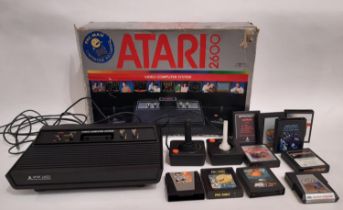 1980’s boxed Atari 2600 home video game console with 10 games including Pacman, Star Raiders,