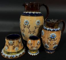 Collection of Doulton Ribbed ware comprising two jugs of graduated form and two vestas, all with