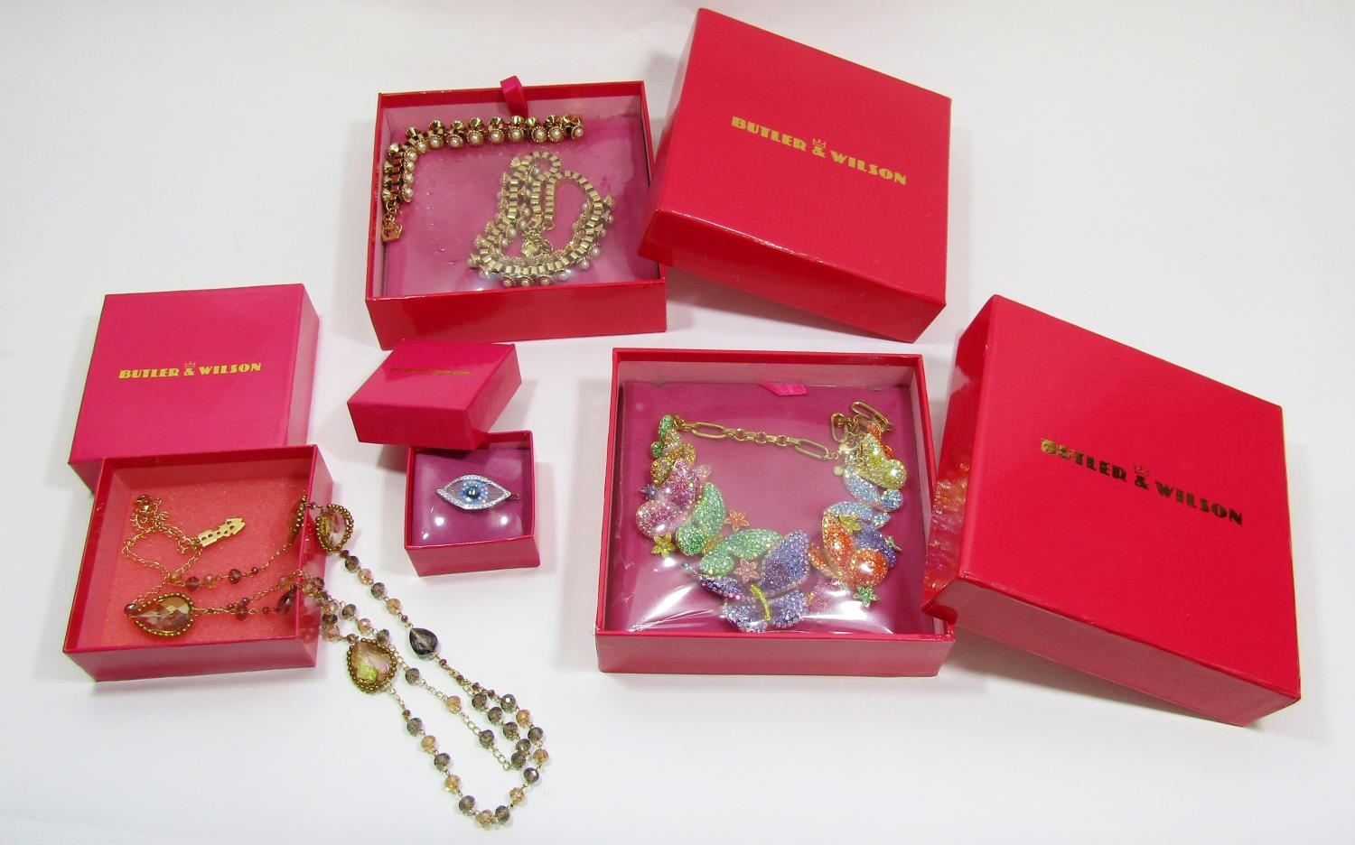Group of boxed Butler & Wilson costume jewellery to include three pieces still sealed in plastic,