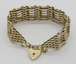 Vintage 9ct twisted gate link bracelet with heart padlock clasp, 27.3g