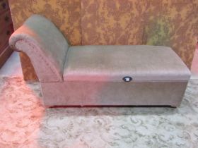 A vintage upholstered day bed and combined box ottoman with swept and rolled head rest