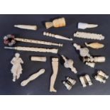 A collection of small turned bone objects to include Stanhopes, binoculars, whistle, etc