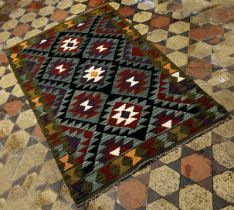 A Maimana Kilim carpet, with alternating rows of regular and stepped diamonds, 153 x 94cm.