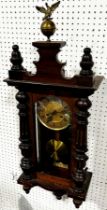 A Edwardian wall clock, brass dial and eight day striking movement