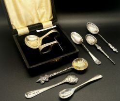 A cased silver feeder and silver pusher and six various small spoons, 3.6oz approx.