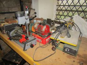 An extensive collection of workshop tools including an Emco Unit PC mini lathe, drill press,