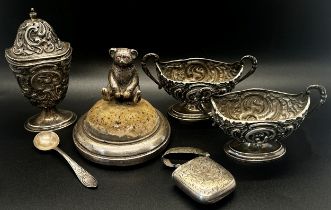 An unusual Teddy Bear mounted silver pin cushion, together with a silver condiment set and a