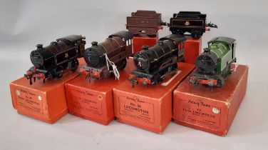 4 post war 0 gauge Hornby reversing clockwork 0-4-0 Tank locomotives in original boxes comprising No