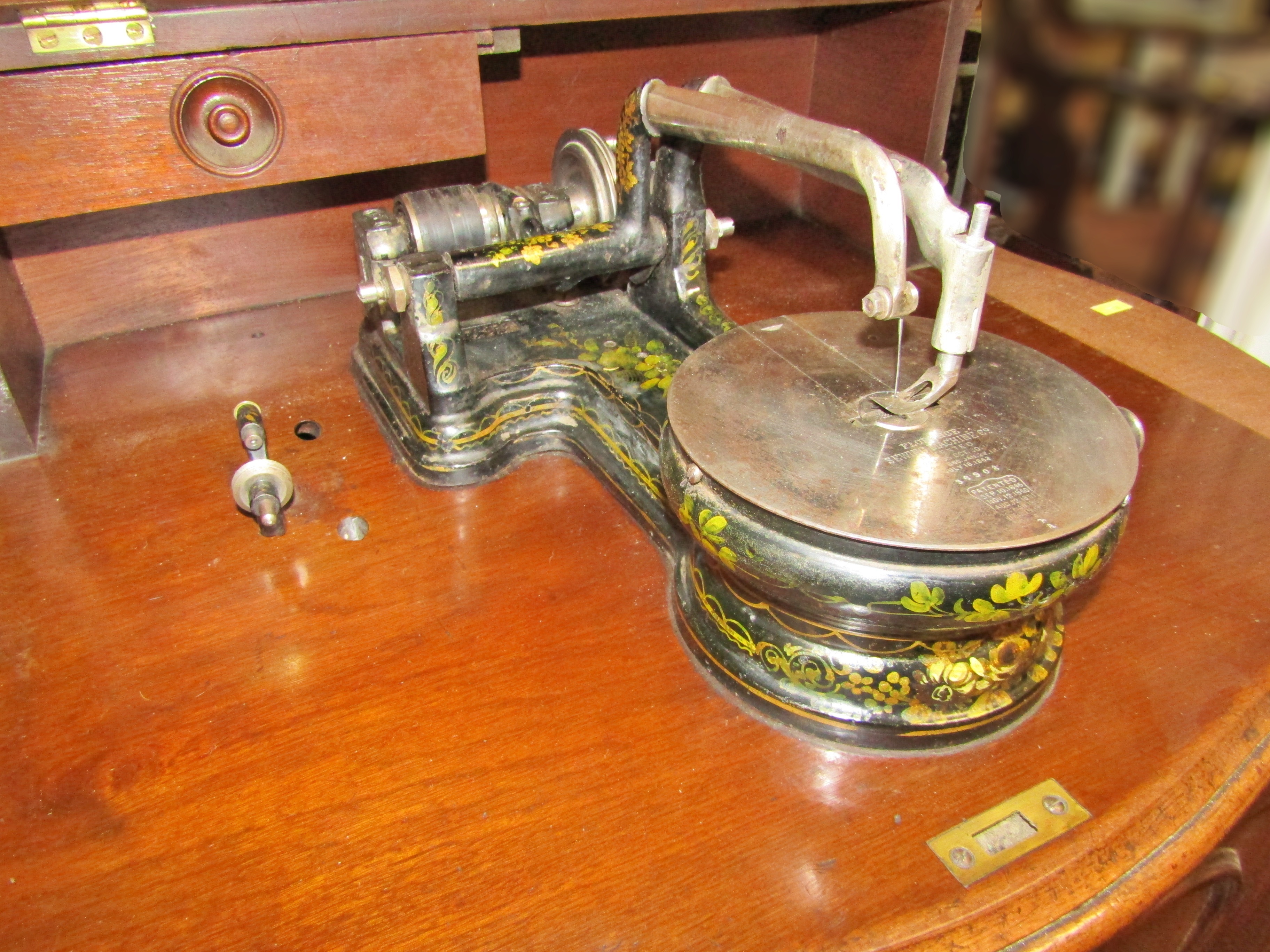 A rare 1865 Florence Sewing Machine co. in full cabinet no.35908 with floral decoration, complete - Image 8 of 17