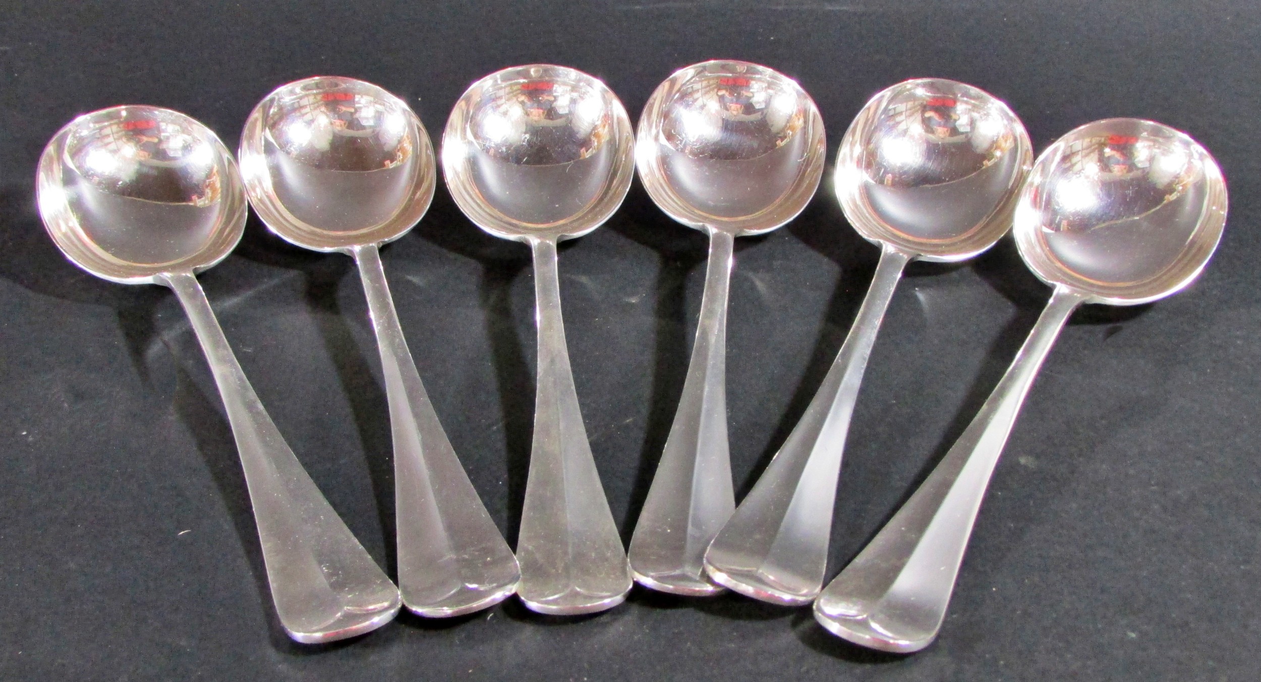 Six silver soup spoons, Birmingham 1931, maker Barker Brothers Silver Ltd, 16.6oz approx - Image 2 of 3