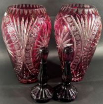 A pair of Bohemian glass vases with star burst panels (AF) 36cm high, and a pair of purple moulded
