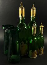 A mixed decorative collection to include four bottle green bottles with metal sleeves a pair of