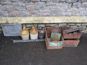 Two vintage stoneware flagons with impressed and printed merchants marks, 30 cm high, a vintage hand