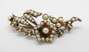 Antique yellow metal floral spray brooch set with pearls, 5.2cm W approx, 10.7g