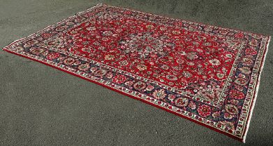 North West Persian Tabriz Carpet with an all over floral pattern around a central floral spandrel on