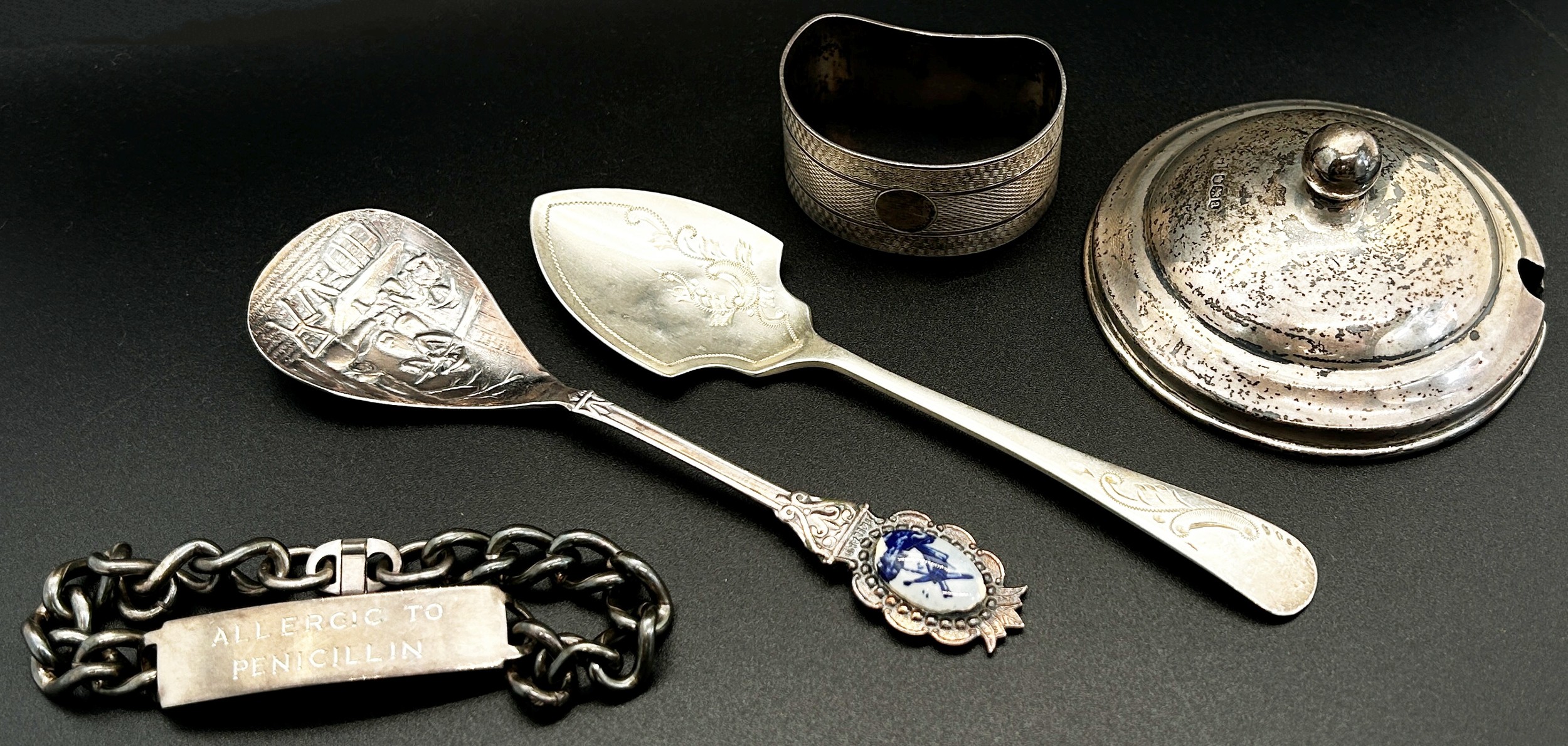 Four small silver trophies, a silver jar lid, two silver spoons, a napkin ring and a bracelet, 8 - Image 3 of 3