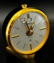 Jaeger-LeCoultre, a Recital 8-day alarm travel clock, calendar aperture and within a gilt casing and