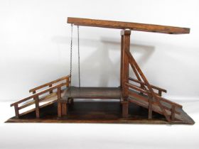 A wooden model of a Dutch Canal Lifting Bridge, 87cm x 47cm.