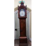 A Georgian mahogany longcase clock the trunk with full length door the arched hood with pagoda