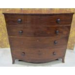 A Georgian mahogany four drawer bow fronted bedroom chest with shaped apron and splayed bracket