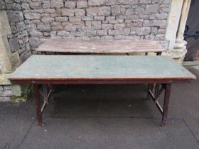 Two vintage folding trestle tables, one in pine with folding framework