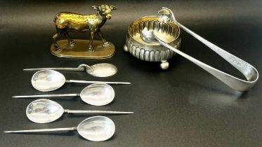 Six silver coffee spoons, a pair of sugar tongs, a salt cauldron, a single silver napkin ring and